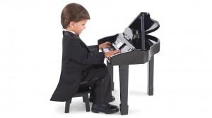 child performing on a piano