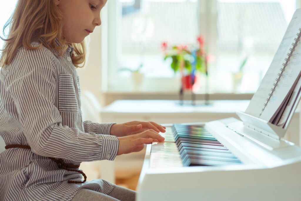 Student playing piano