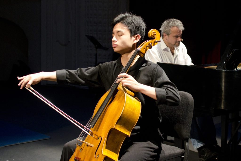 student practicing cello