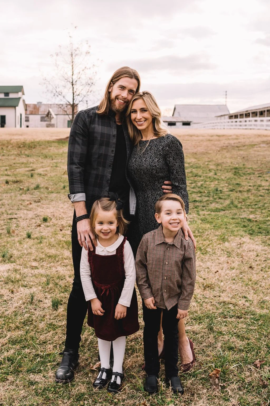 Brandon with his wife and kids